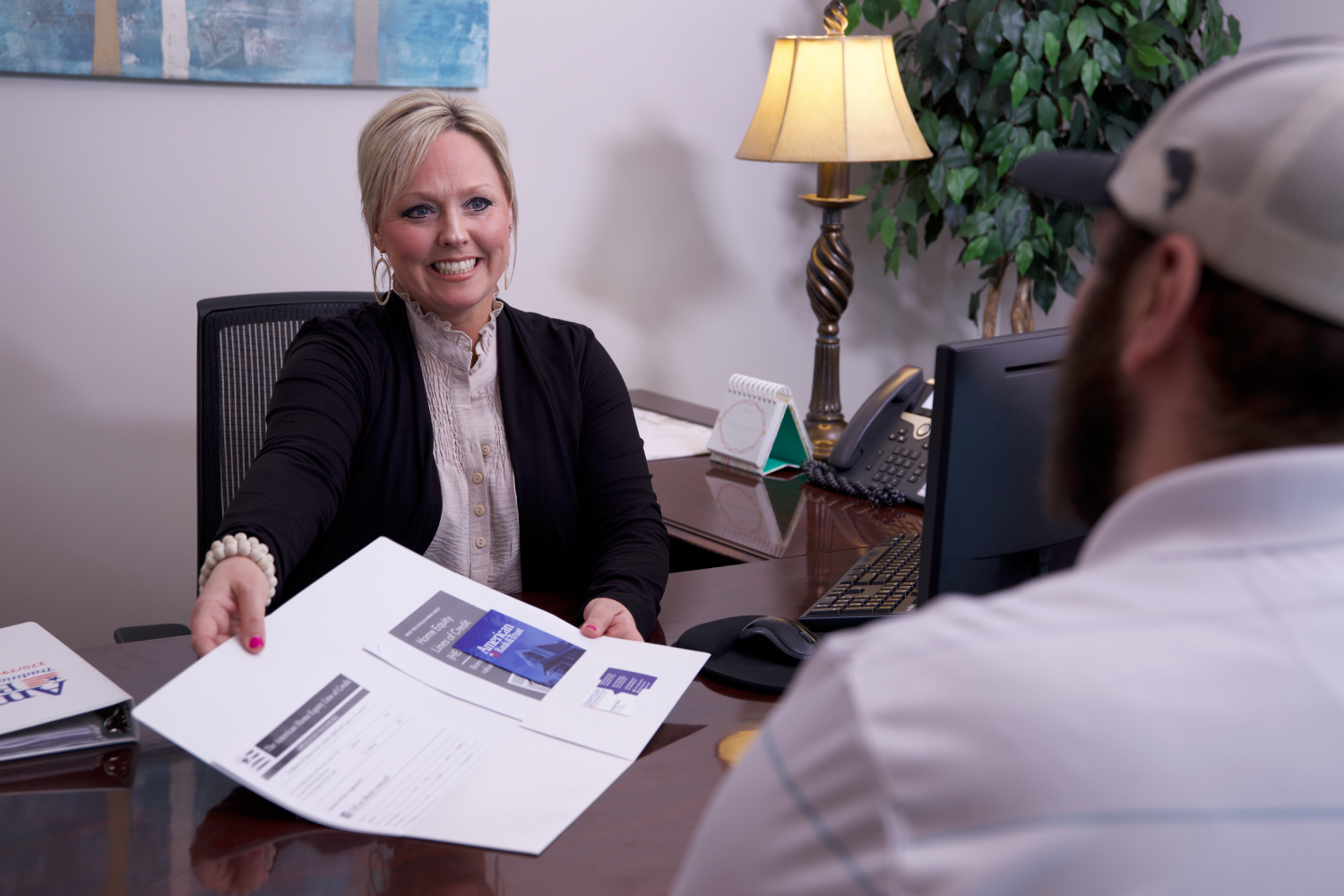 career-sub American Bank's smiling staff.