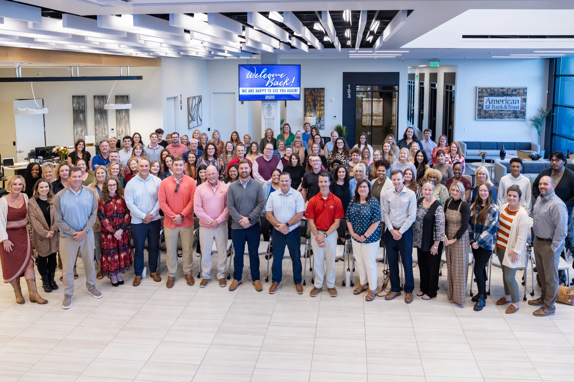 American Bank's smiling staff. 
